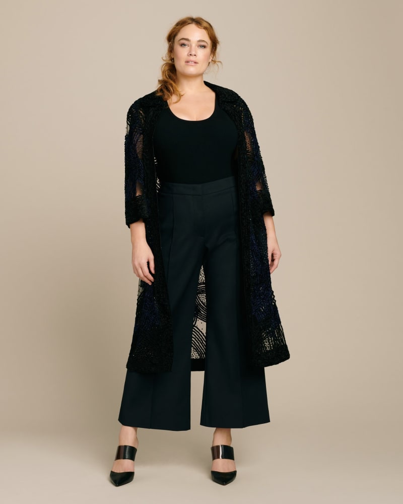 Front of a model wearing a size XL Embroidered Chenille Coat in Black by Naeem Khan. | dia_product_style_image_id:231087